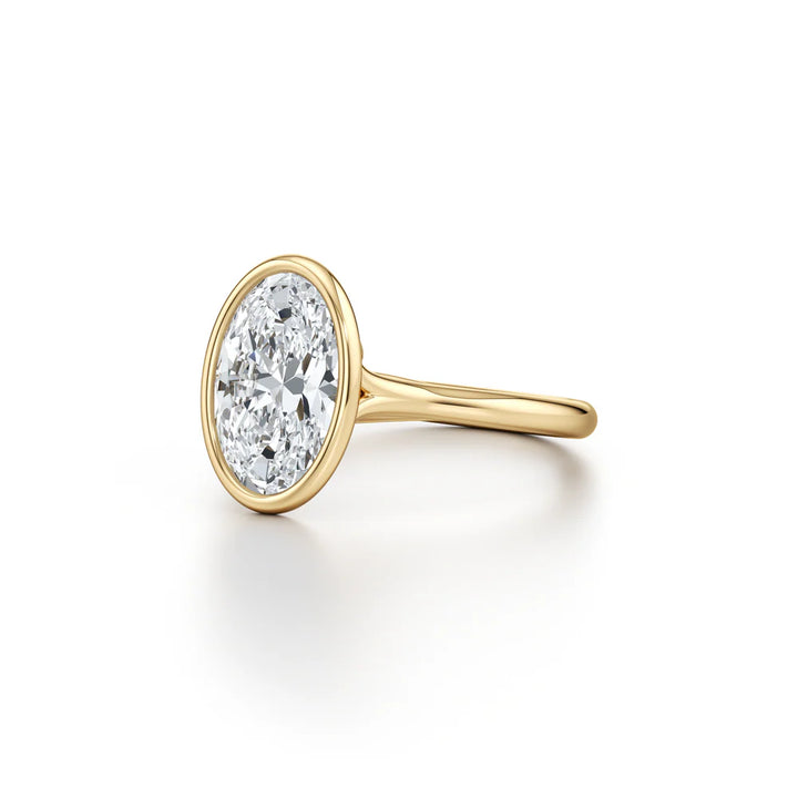 Eclipse Solitaire Engagement Ring – Oval Cut – Bezel-Set High-Polish Band