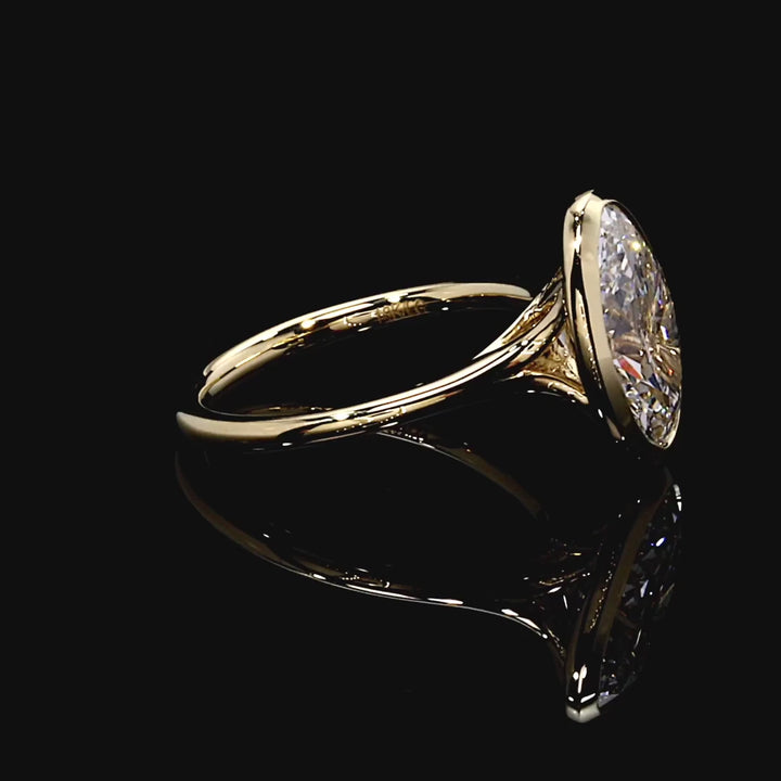 Eclipse Solitaire Engagement Ring – Oval Cut – Bezel-Set High-Polish Band